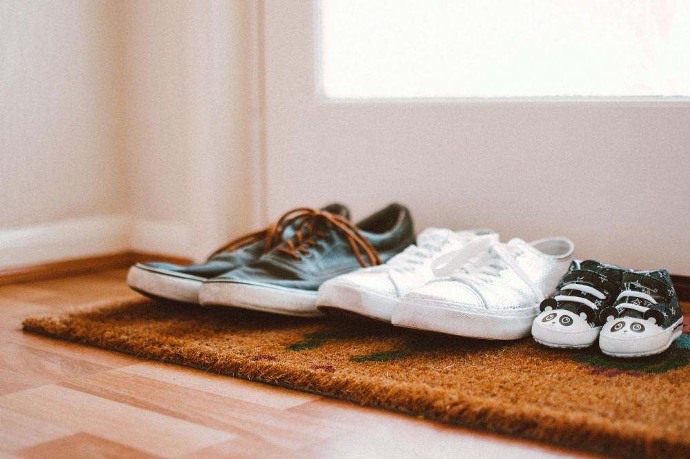 Crie espaços diferenciados para organizar seus sapatos